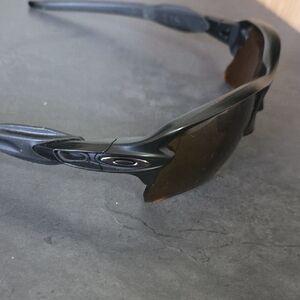Oakley Black Frame Sunglasses with Brown Lenses